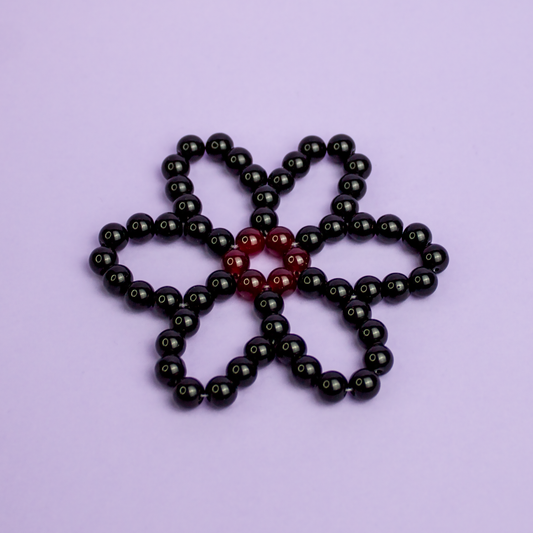 Dessous de verre Marguerite noire