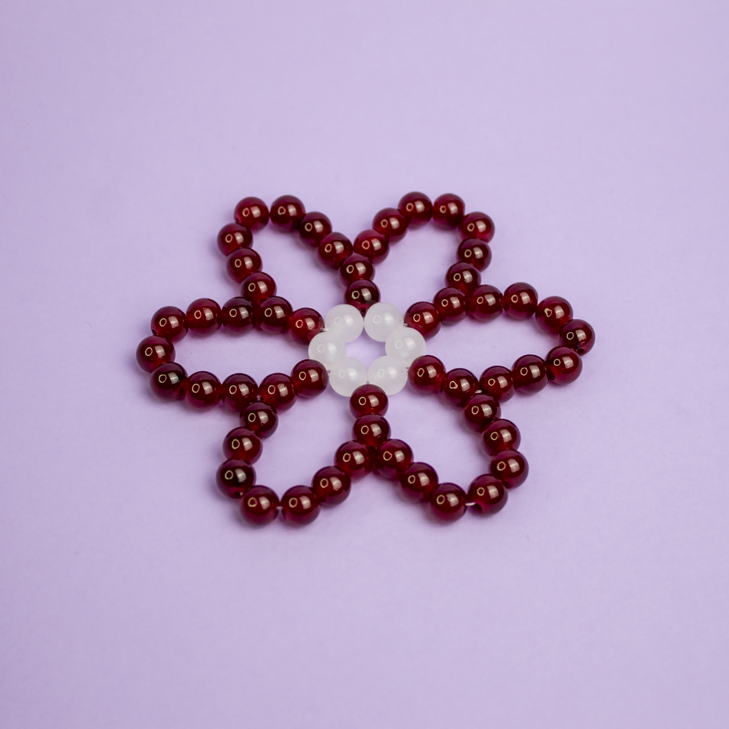 Dessous de verre Marguerite rouge bordeaux